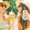 two women enjoying cold beverages in their 16oz soda can style glasses on a summer day.